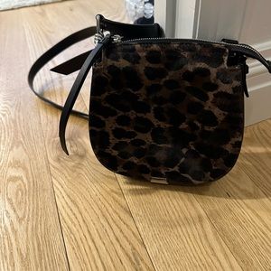 All Saints Leopard print cross body bag.